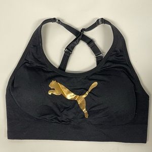 Medium sized PUMA brand sports bra with light padding and cross back
